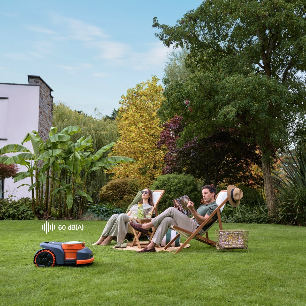 Segway Navimow i105E robot lawn mower mows a peaceful garden.