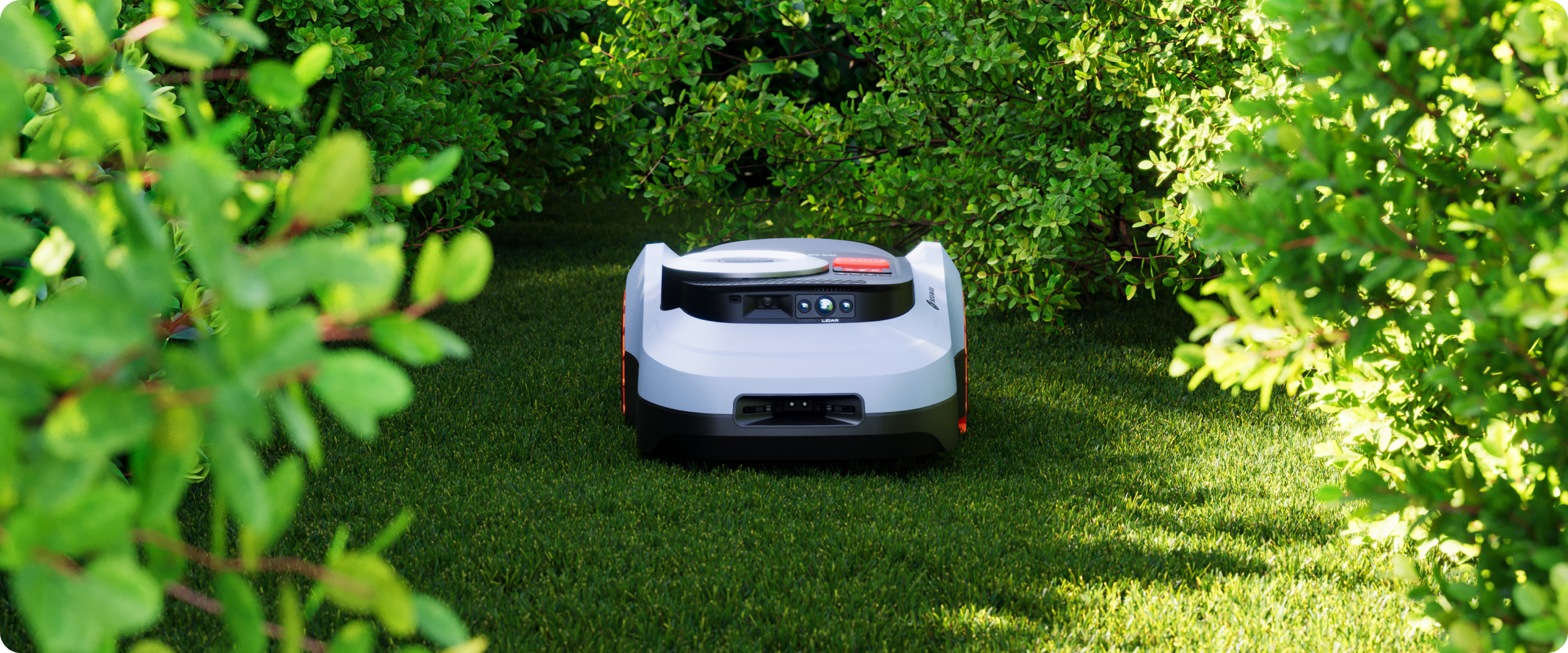 Segway Navimow i Series robot lawn mower on green grass.