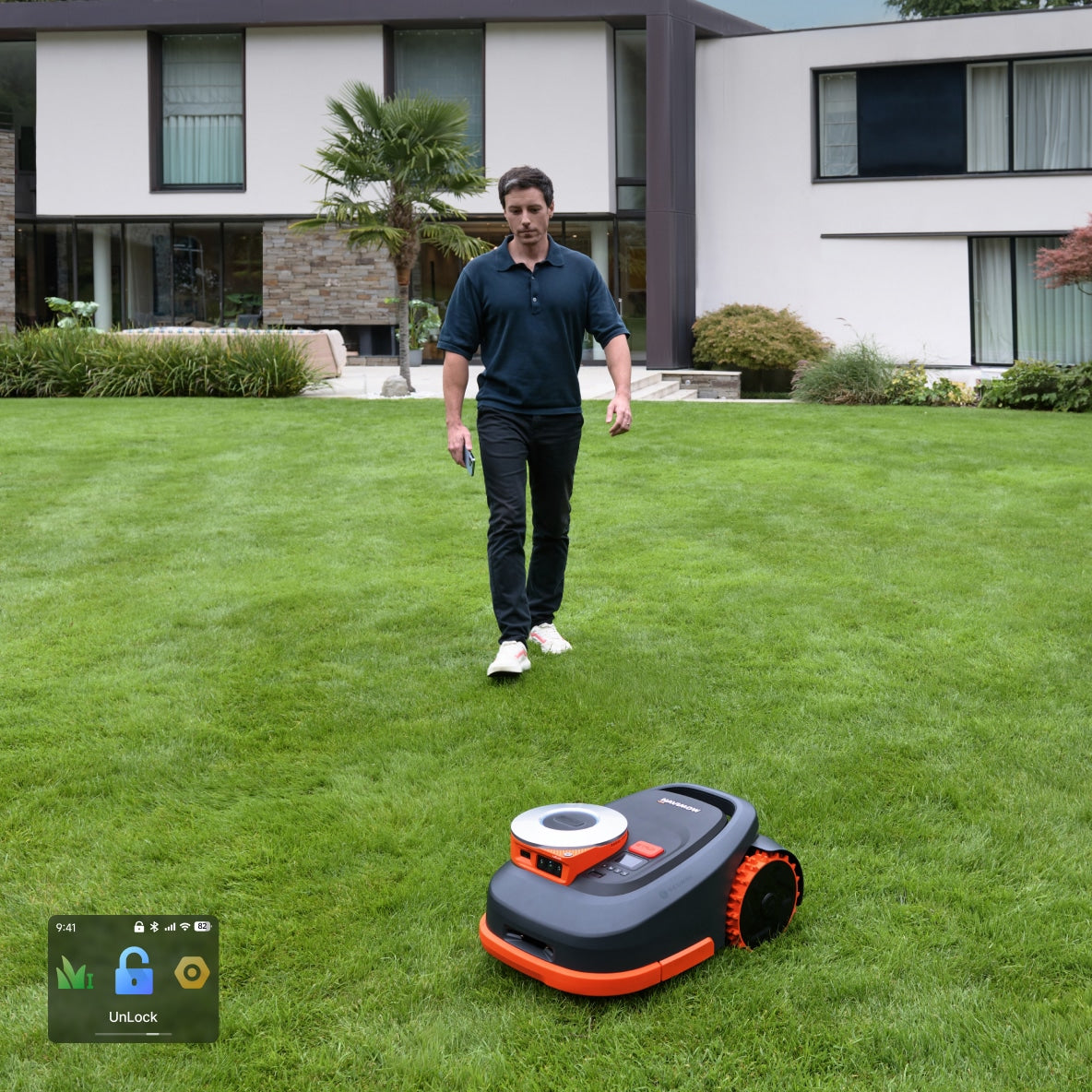 Navimow i110N robot lawn mower mows a lush green lawn.