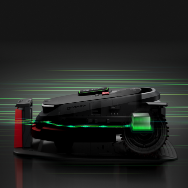 Navimow i Series robot lawn mower charging on its station.